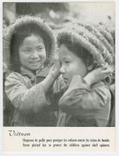 Card displaying two children with French and English caption below.