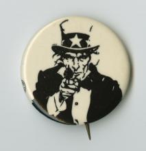 Peace pin with Uncle Sam holding a gun.