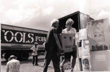 People unloading aid supplies.